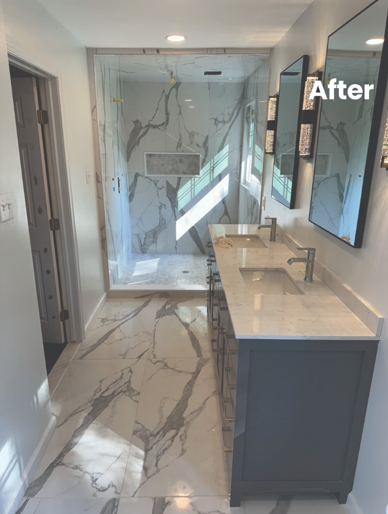After picture of a newly renovated bathroom with white granite surfaces