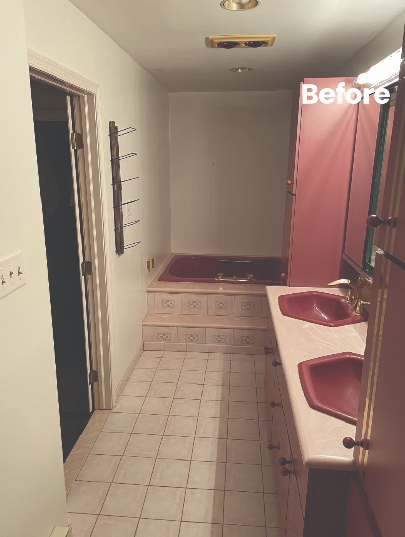 Before picture of an outdated bathroom with red accents
