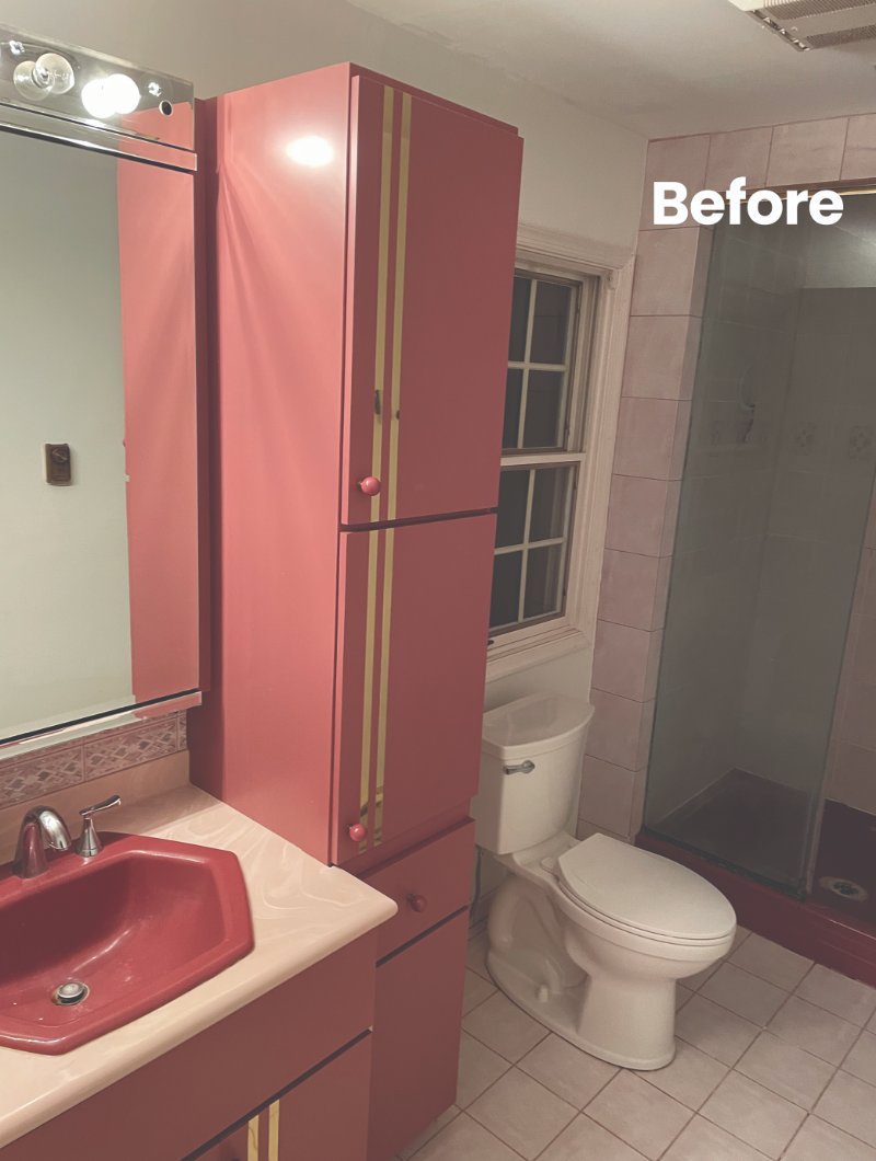 Before picture of an outdated bathroom with red cabinets